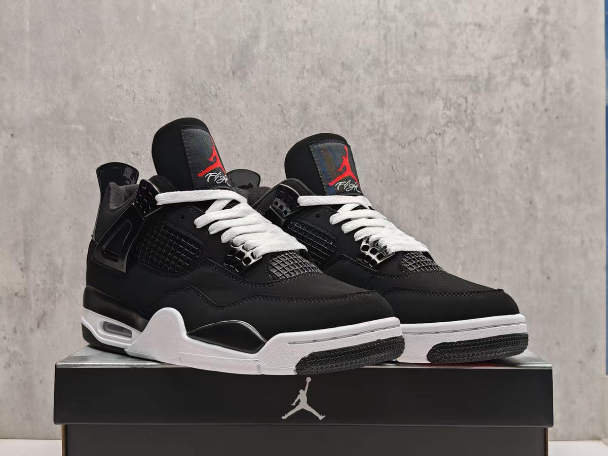 Air Jordan 4 Retro — Black Suede with Red Tongue Branding