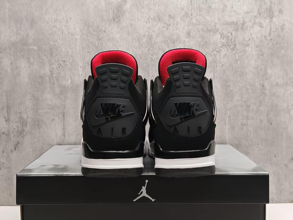 Air Jordan 4 Retro — Black Suede with Red Tongue Branding