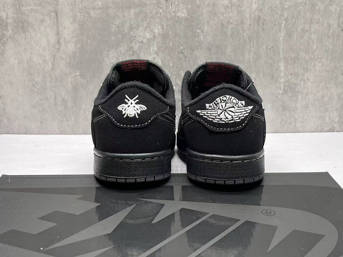 Air Jordan Black and White Leather Sneakers